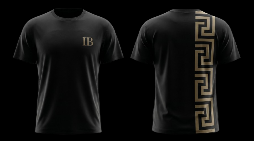 Meander tee — IB monogram on front chest, gold Greek key column down the back
